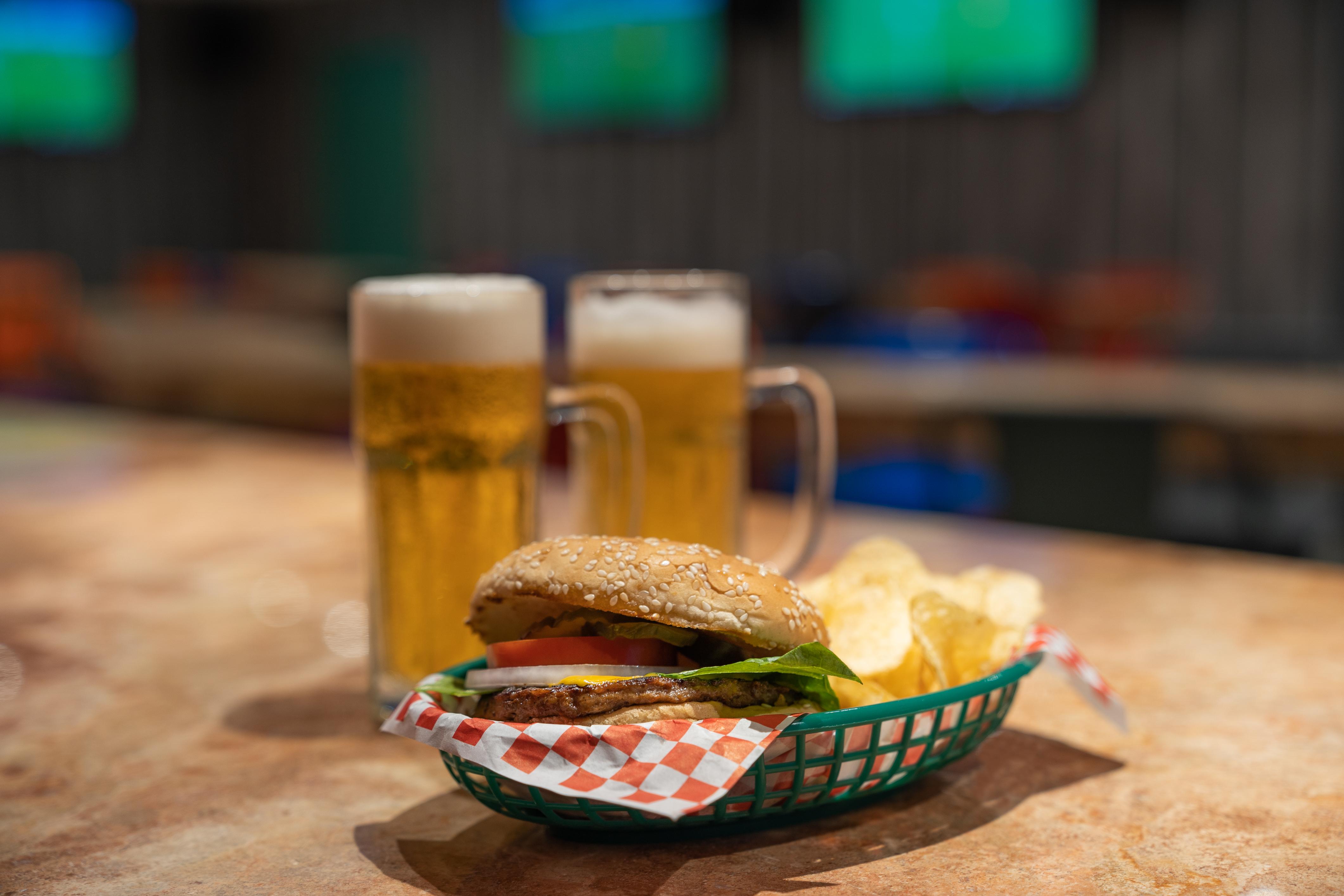 Grand Park Royal Puerto Vallarta Extérieur photo A cheeseburger and beer at a restaurant